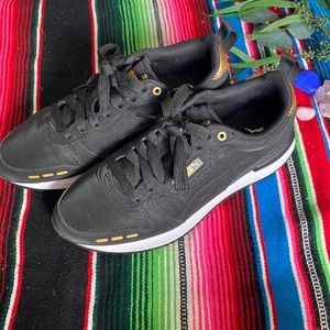 Black and Gold Puma SoftFoam Sneakers
